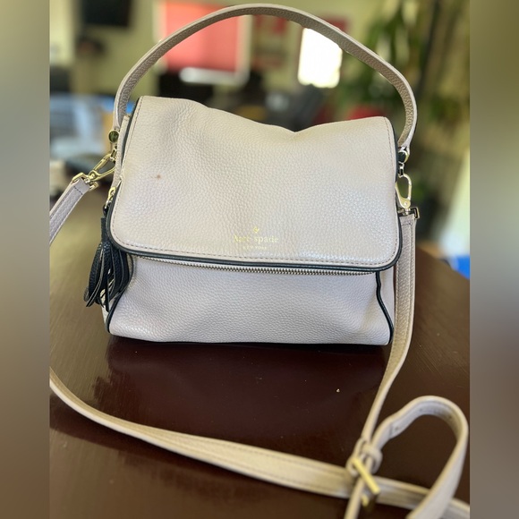 kate spade Handbags - Kate Spade Cream Crossbody Bag with Structured Design